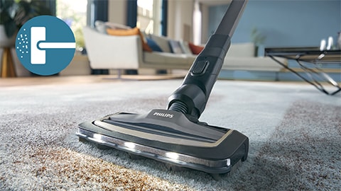 Philips AquaTrio juhtmeta tolmuimeja ja pesuri 9000 seeria puhastamas vaipa ja vaipkatet