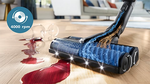 Philips AquaTrio juhtmeta tolmuimeja ja pesuri 9000 seeria puhastamas patenteeritud suure kiirusega harjaga